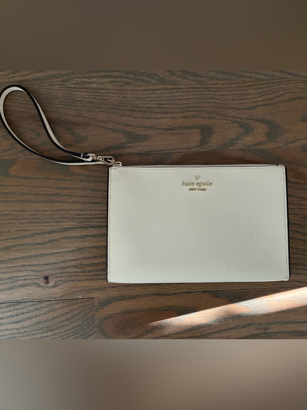 kate spade Cream Saffiano Zip Wristlet with Gold Logo